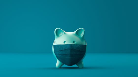 Piggy bank wearing a face mask